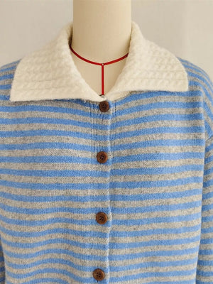 Blue and gray striped knit cardigan with a textured white collar and button front.