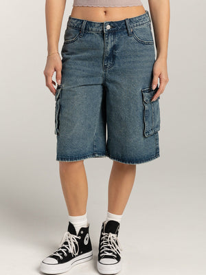Light blue denim cargo bermuda shorts with button closure and flap pockets.