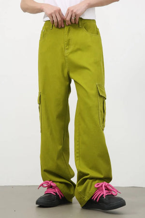Acid wash cargo pants in yellow-green, 100% cotton, wide leg with cargo pockets.