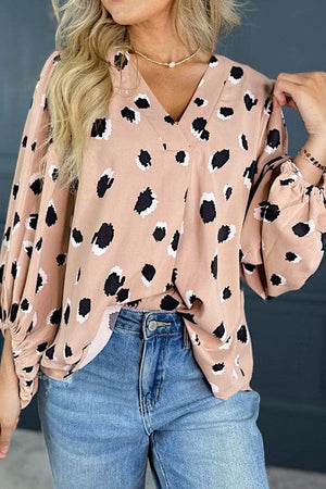 Blouson sleeve spot print silk blouse in dust storm with a v-neck.