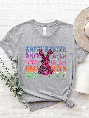 Gray t-shirt with leopard bunny graphic and glitter text reading Happy Easter in rainbow colors.