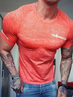 Performance knit gym tee in coral with a crew neck and short sleeves.