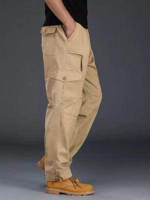 Khaki cargo pants for men with multiple pockets and a zippered side pocket.