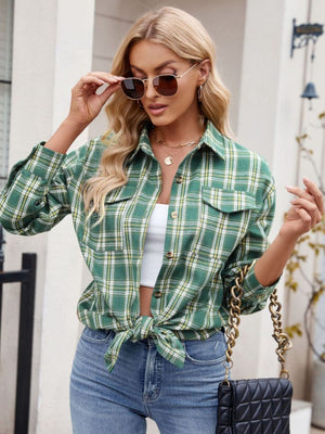 Green plaid overshirt with patch pockets and buttoned front, tied at the waist.