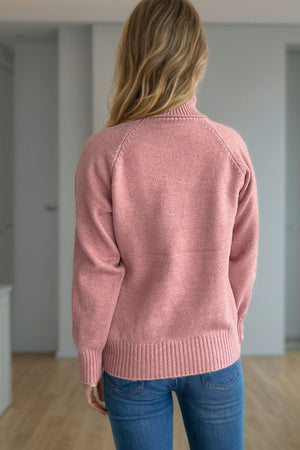 Blush pink speckled Donegal turtleneck sweater with ribbed cuffs and hem