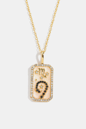 Scorpio zodiac sign crystal pendant necklace with 14K gold-plated chain and bezel.