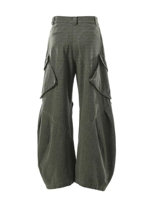 Textured paneled cargo pants in army green with baggy fit and multiple flap pockets.