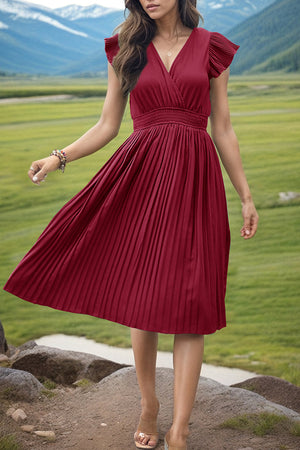 Deep Red pleated dress with flutter sleeves and V-neck, cinched waist, and midi skirt.