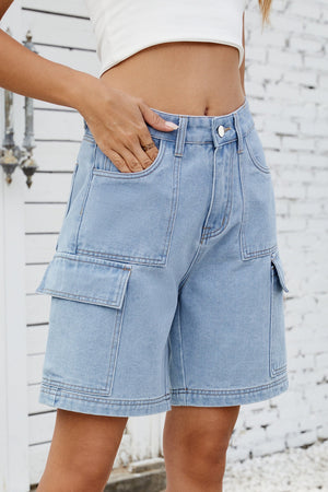 Medium wash denim utility shorts with cargo pockets and contrast stitching.