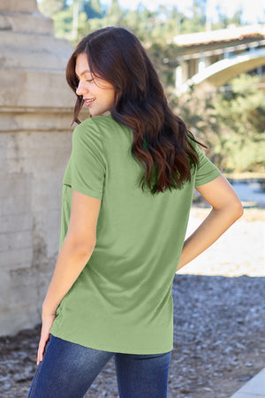 V-neck pocket tee in Matcha Green with short sleeves and a relaxed fit.
