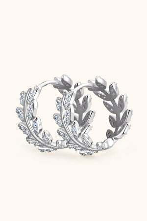 Silver leaf pavé hoop earrings with cubic zirconia accents, made of 925 sterling silver.