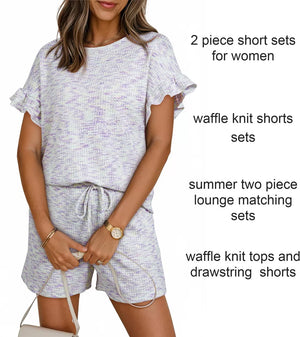 Ruffled sleeve two-piece set in white with purple flecks, waffle knit top and drawstring shorts.