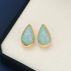 Teardrop stud earrings with gold base and pave blue stones