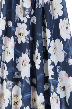 Dark Blue chiffon midi skirt with white magnolia print and belted detail.