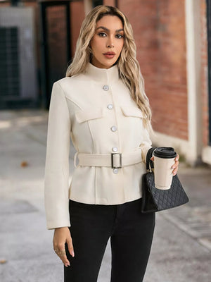 Belted button-up trench coat in beige with a stand collar and silver buttons.