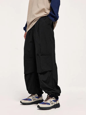 Black cargo joggers with drawstring waist and utility pockets