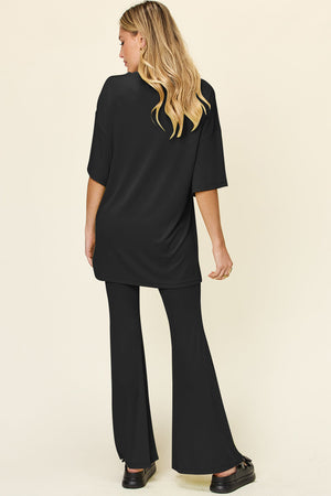 Black oversized tee and flare leg pants set, casual outfit