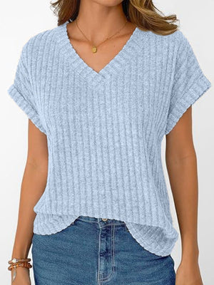 Light blue ribbed v-neck t-shirt with cuffed short sleeves and a relaxed fit.