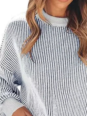black pullover sweater featuring ribbed and striped