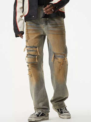 Men's distressed jeans with unique wash and ripped details