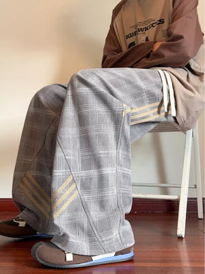 Men's Plaid Wide-leg Sweatpants With Side Stripes in Green, close-up detail