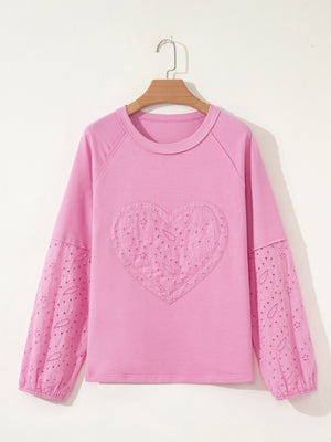 Pink cotton crew-neck sweatshirt with embroidered heart detail and eyelet sleeves