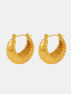 Gold-tone sculpted crescent hoop earrings with beaded edges