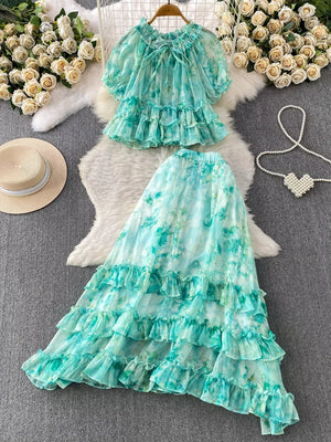 Light green floral ruffle set with bow detail and tiered skirt.
