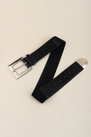 Black faux leather belt with elastic back and silver buckle detail.