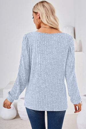 Light Blue ribbed square neck top with puffed sleeves and long sleeves.