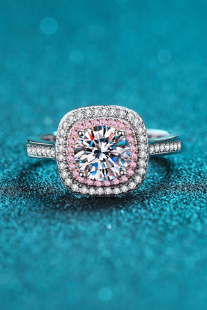 Silver ring with halo moissanite and pink diamond accents