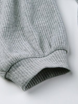 Grey ribbed knit hoodie sleeve cuff detail