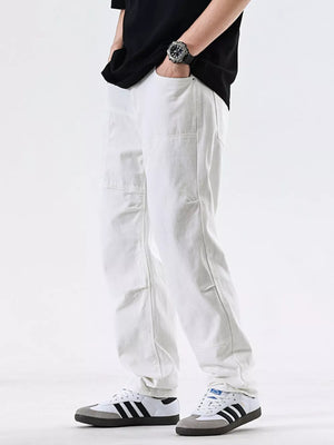 Men's white cotton jeans with pocket detail and relaxed fit