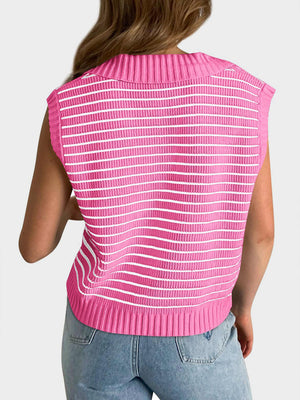 Pink ribbed knit polo vest with white horizontal stripes and a collared neckline.