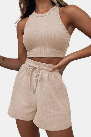 Tan ribbed knit crop top and drawstring shorts set with racerback neckline.