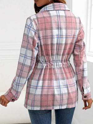 Belted blush pink plaid shacket with drawstring waist and utility detailing.