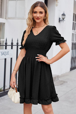 Black textured dot puff sleeve fit-and-flare dress with v-neck and ruffled hem