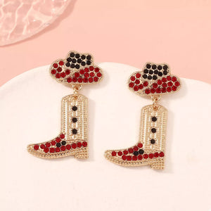 Red and black rhinestone cowboy boot dangle earrings with hat detail.