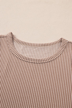 Tan textured stripe tank top with crew neck and ribbed trim.