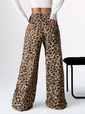 Leopard print lounge palazzo trousers with a bow detail, wide leg, and high waist.