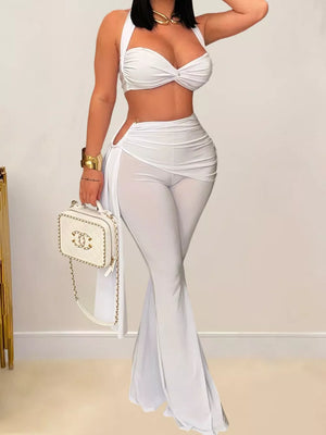 Halter Neck Top And Flare Pants Set in Black, model styling view