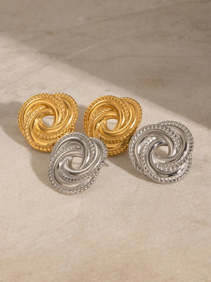 Golden Swirl Knot Stud Earrings in gold and silver, 18K gold-plated, textured knot design.