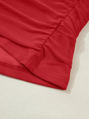 Deep red sheer mesh maternity blouse with ruched detail and long sleeves.