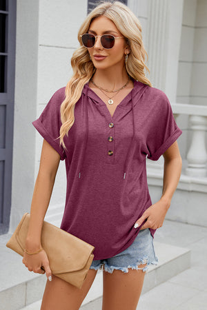 Henley hooded tee in Red-Violet with rolled short sleeves and button placket.