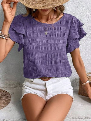 Textured ruffle sleeve smocked top in purple, 100% polyester, with a round neckline.