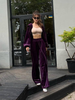 Plush velour lounge set in Violet featuring wide leg pants and a relaxed fit jacket.