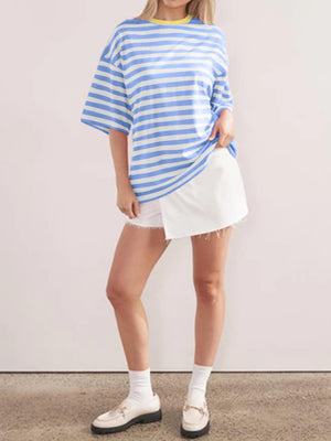 Oversized striped tee in light blue and white with dropped sleeves and a yellow neckline.