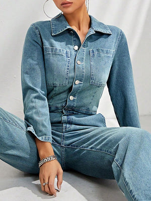 Structured light denim boiler suit with button front and chest pockets.