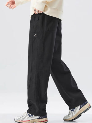 Men's black loose fit drawstring sweatpants with cargo pocket detail