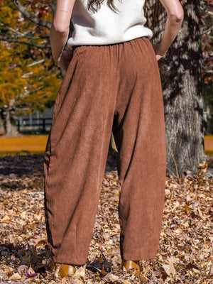 Brown corduroy wide-leg pants with pockets and elastic waist